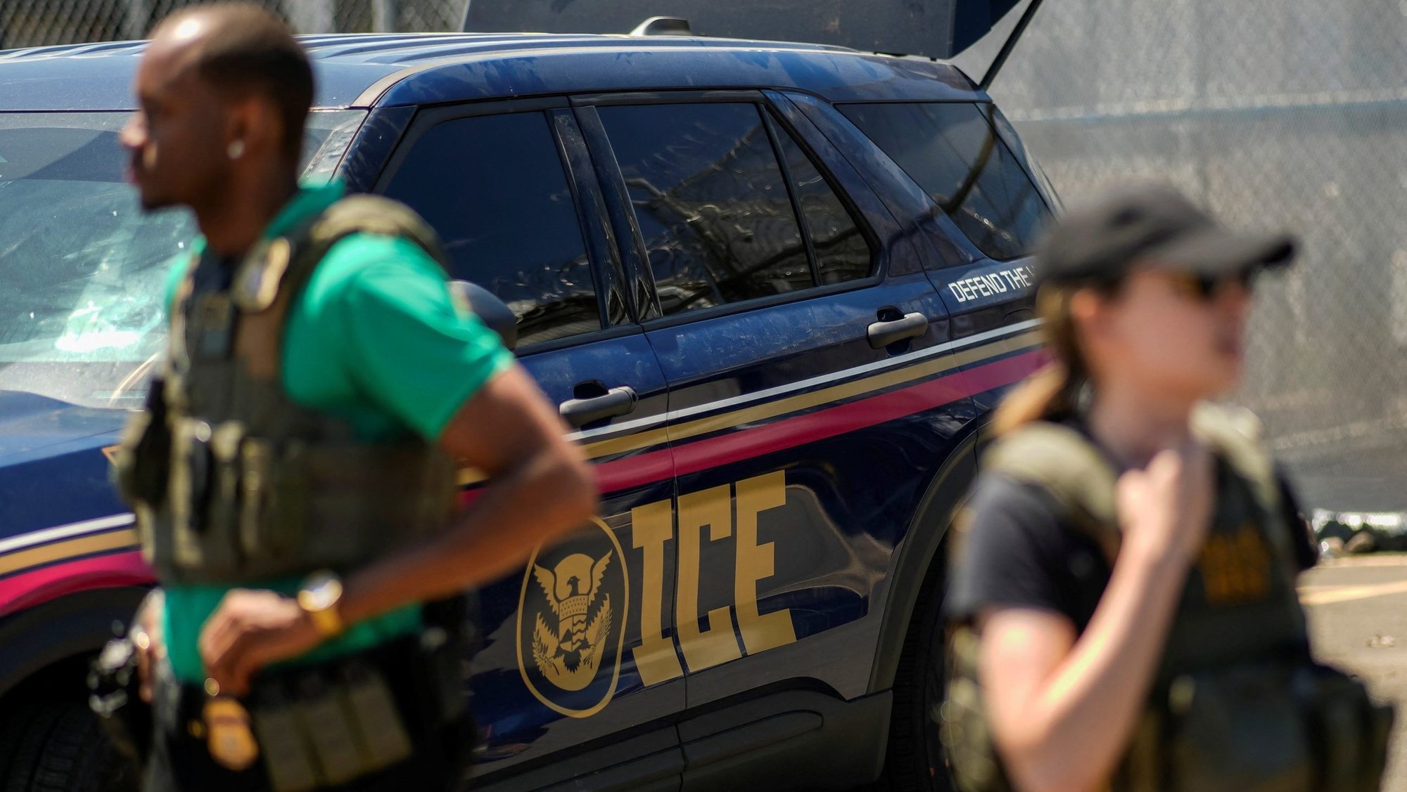 U.S. Immigration and Customs Enforcement agents stand guard, as ICE and federal agents secure the entrance to the Delaney Hall detention center while demonstrators gathered outside in Newark, New Jersey, May 29, 2026. The Archdiocese of Indianapolis has provided a dispensation to Catholics who fear being targeted by immigration enforcement going to and from Sunday Mass regardless of their legal status. (OSV News photo/Eduardo Munoz, Reuters)