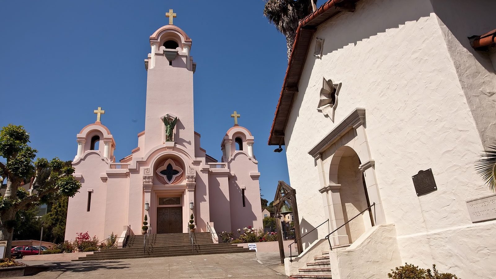 The exterior of Mission San Rafael Arcángel in California, at right, is pictured in an undated photo. A new pilgrimage route in his honor has been created, the 'Camino' of St. Francis, stretching from Mission San Rafael Arcángel to Mission Dolores in San Francisco. The 24.56 miles of streets, paths and trails are broken into four segments, so a potential journey can be calibrated. (OSV News photo/courtesy Archdiocese of San Francisco)
