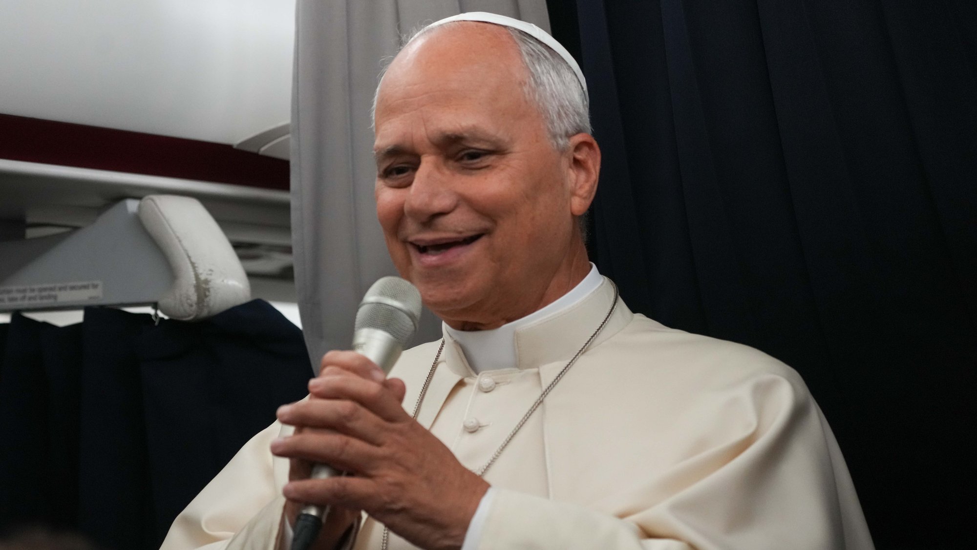 Pope Leo XIV speaks with journalists aboard his flight back to Rome Sept. 28, 2026, after concluding his apostolic journey to France and visit to UNESCO. The pope visited Paris, Saint-Denis, Lourdes and Metz during the Sept. 25-28 trip. (CNS photo/Lola Gomez)