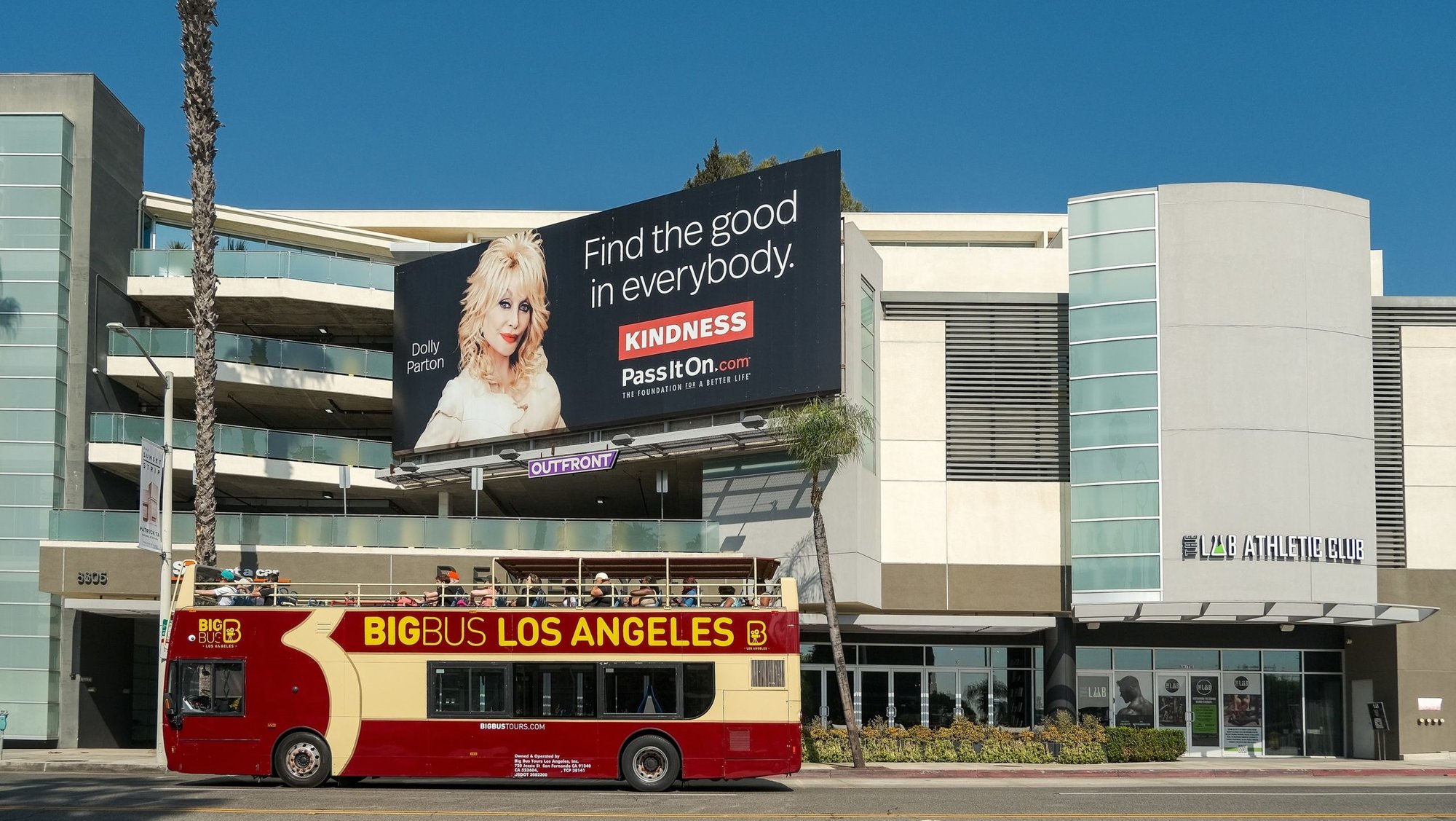 Dolly Parton featured on a billboard in Los Angeles in 2024. (Shutterstock)