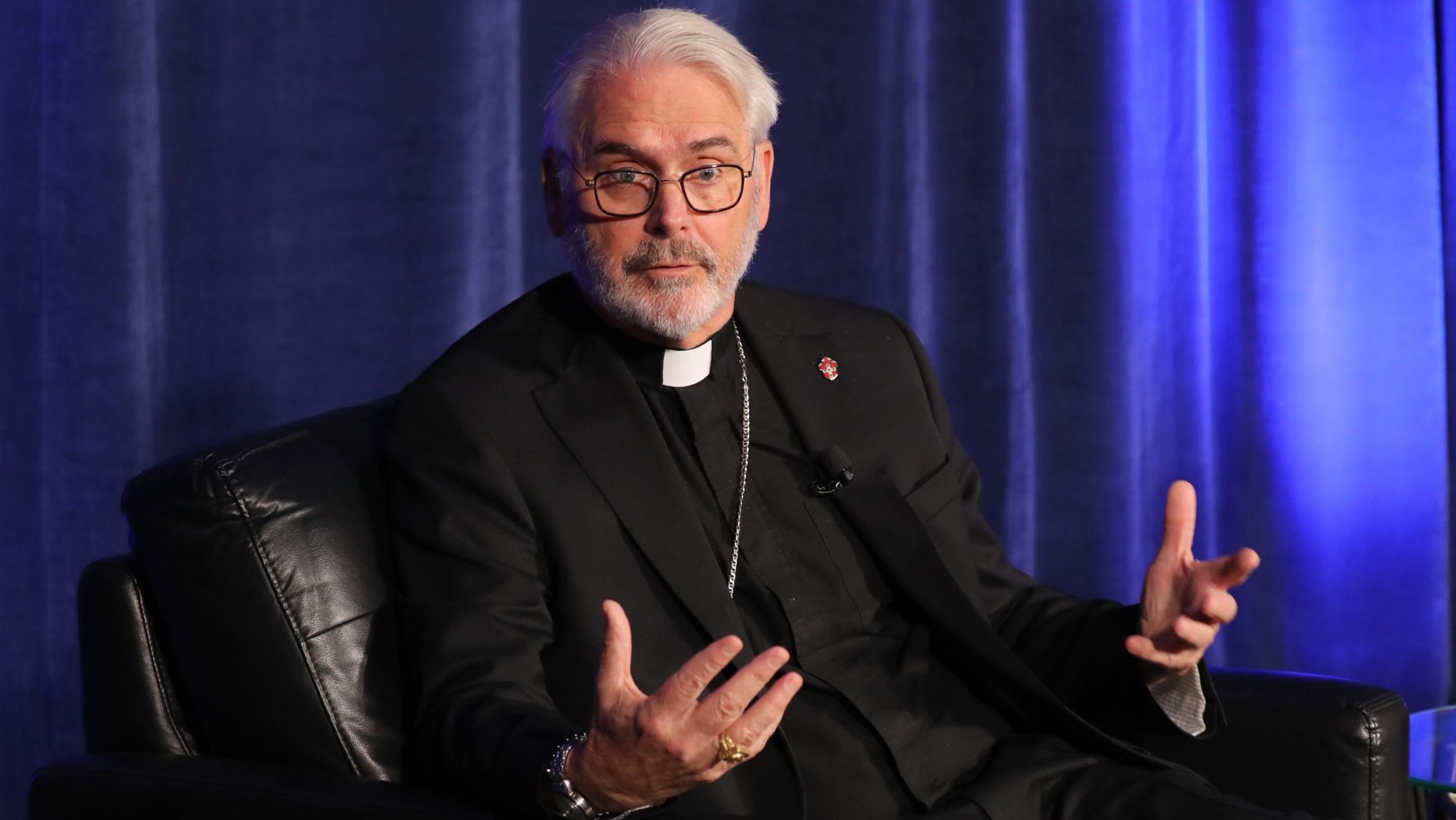 Archbishop Paul S. Coakley of Oklahoma City, president of the U.S. Conference of Catholic Bishops, gestures during a news briefing during a June 10, 2026, session of the annual spring meeting of the USCCB in Orlando, Fla. After Pentagon officials said they planned to livestream the execution of Fort Hood shooter Nidal Malik Hasan by firing squad in December, the president of the U.S. Conference of Catholic Bishops denounced the plan as "barbaric” in an Oct. 9 statement. (OSV News photo/Bob Roller)