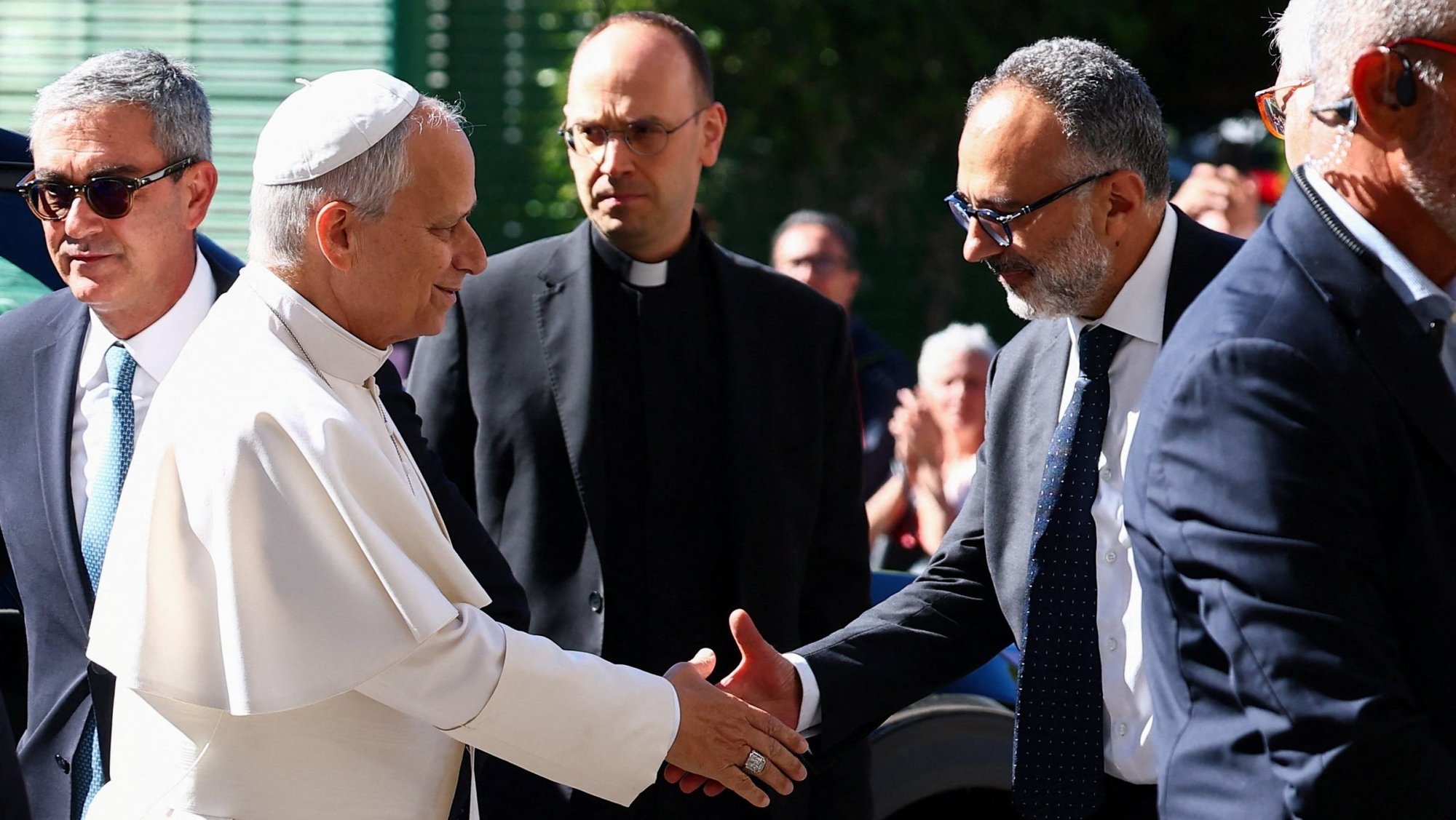 Pope Leo XIV is greeted by his personal physician, Luigi Carbone, as the pontiff arrives at Rome's Gemelli Hospital Oct. 13, 2026, ahead of his surgery that afternoon to remove a lung nodule. The Vatican confirmed that evening that Pope Leo has lung cancer. (OSV News photo/Guglielmo Mangiapane, Reuters)
