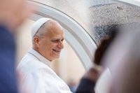 Pope Leo XIV smiles from the popemobile while riding around St. Peter’s Square at the Vatican before his weekly general audience Oct. 21, 2026. (CNS photo/Lola Gomez)