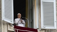Pope Leo XIV clasps his hands after leading the Angelus in St. Peter's Square at the Vatican Oct. 18, 2026, after being released from the hospital the previous day. (OSV News/Matteo Pernaselci, Vatican Media)