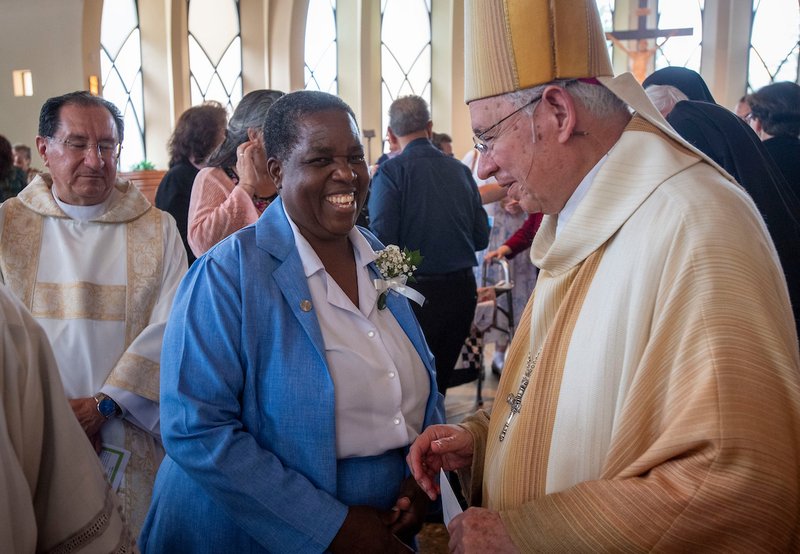Sister Pascazia Kinkuhaire shares a smile with Archbishop Gomez at the 100th anniversary celebration for the Daughters of Mary & Joseph