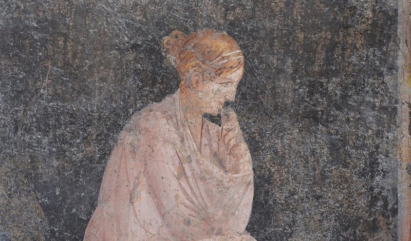 Un fresco del siglo I de Pompeya que representa a una mujer pensando. Las mujeres -entonces como ahora- eran a menudo víctimas de abortos forzados. (Carole Raddato/Museo Arqueológico Nacional de Nápoles/Wikimedia Commons)