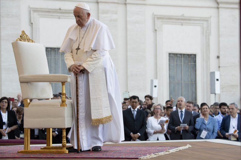 Pope Francis uses a cane as he attends Mass in St. Peter's Square during the World Meeting of Families at the Vatican June 25, 2022. U.S. Cardinal Kevin J. Farrell, prefect of the Dicastery for Laity, the Family and Life, presided at the Mass. (CNS photo/Vatican Media)