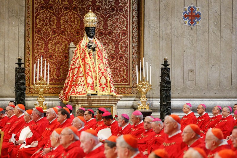 Cardinals and bishops concelebrating Mass with Pope Francis are seated in front of a statue of St. Peter dressed specially for the feast of Sts. Peter and Paul in St. Peter's Basilica at the Vatican June 29, 2023. (CNS photo/Lola Gomez)Cardenales y obispos concelebrando misa con el Papa Francisco están sentados frente a una estatua de San Pedro vestida especialmente para la fiesta de San Pedro y San Pablo en la Cardenales y obispos concelebrando misa con el Papa Francisco están sentados frente a una estatua de San Pedro vestida especialmente para la fiesta de San Pedro y San Pablo en la Basílica de San Pedro en el Vaticano el 29 de junio de 2023. (CNS /Lola Gomez)