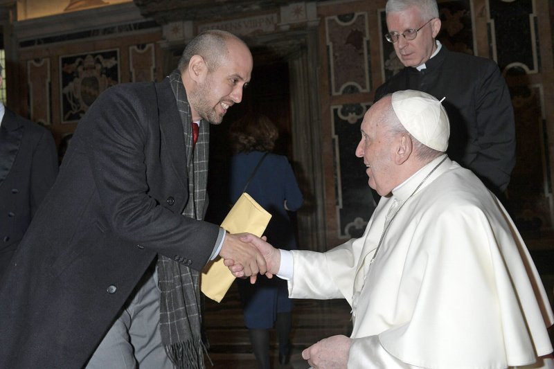 Detroit Catholic en Espanol editor and Juan Diego Network founder Jose Manuel De Urquidi greets Pope Francis during an audience in January 2022. De Urquidi was selected as one of 70 non-bishop voting delegates who will participate in the first general assembly of the Synod of Bishops on Synodality, which will take place Oct. 4-29, 2023, in Rome. (Photo OSV News/courtesy of Juan Diego Network)