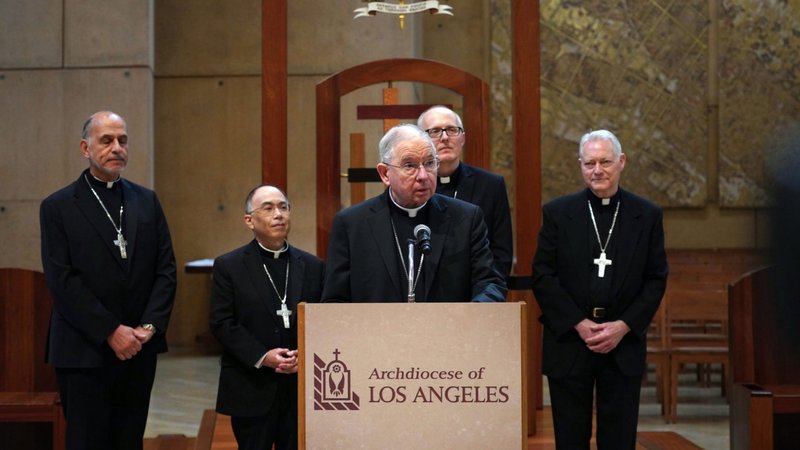 Los Angeles Archbishop José H. Gomez, center, introduces new LA auxiliary bishops appointed by Pope Francis (left to right): Msgr. Albert Bahhuth, Father Brian Nunes, Father Slawomir Szkredka and Father Matthew Elshoff OFM, Cap. (Isabel Cacho/Archdiocese of Los Angeles)