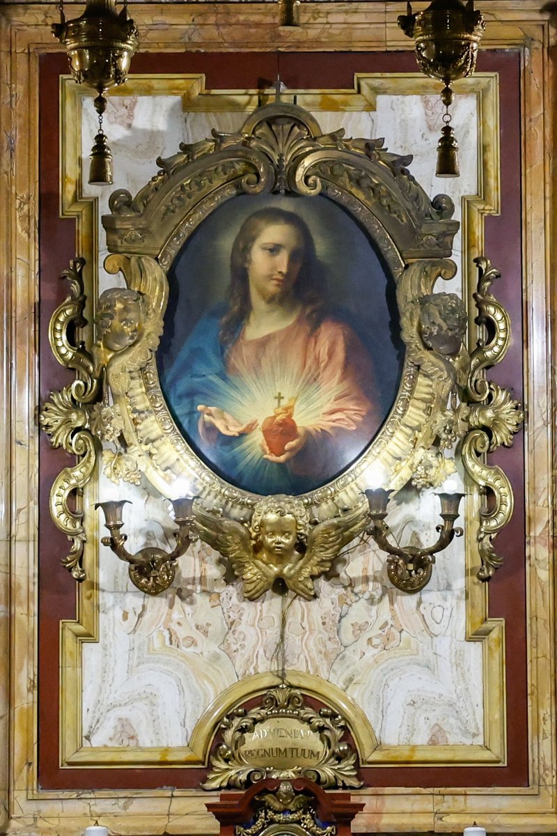 Una pintura de Pompeo Batoni del Sagrado Corazón de Jesús de 1767 se muestra en un marco adornado dentro de la Iglesia Jesuita del Gesù en Roma, 22 de octubre de 2024. (CNS photo/Lola Gomez)