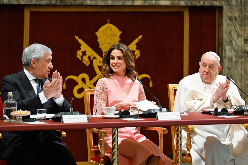 Pope Francis sits alongside Antonio Tajani, deputy prime minister of Italy, left, and Queen Rania of Jordan during the opening of a world leaders' summit on children's rights at the Vatican Feb. 3, 2025. The summit brought together global leaders to discuss the protection and promotion of children's rights worldwide. (CNS photo/Vatican Media)