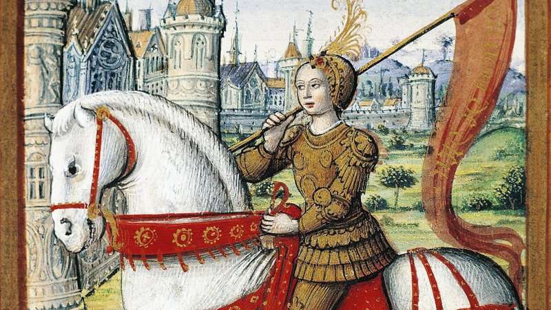 Santa Juana de Arco representada a caballo en una ilustración de un manuscrito de 1504. (Wikipedia)