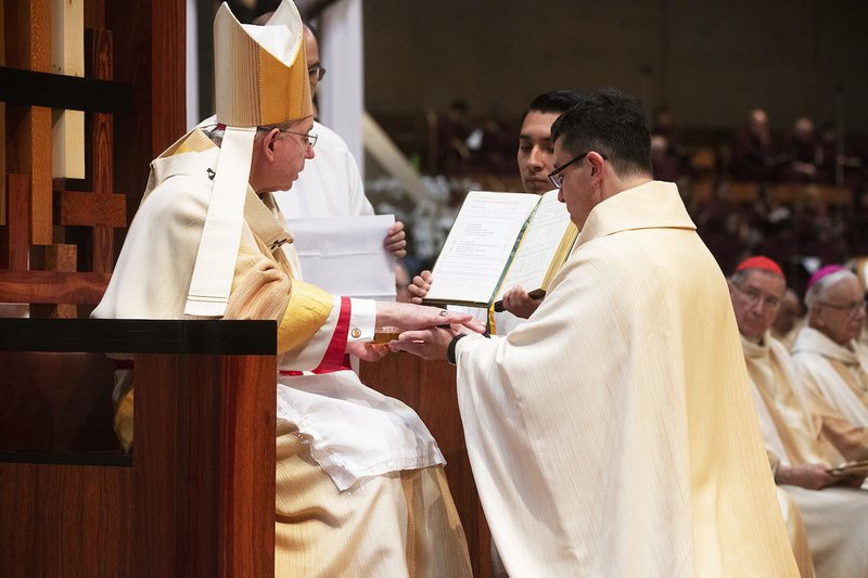 New priests Brian Humphrey, José María Ortiz, Miguel Ángel Ruiz, Luther Diaz, Emmanuel Delfin, and Louis Sung were ordained by Archbishop José H. Gomez on Saturday, June 1, at the Cathedral of Our Lady of the Angels. VICTOR ALEMÁN/ANGELUS NEWS