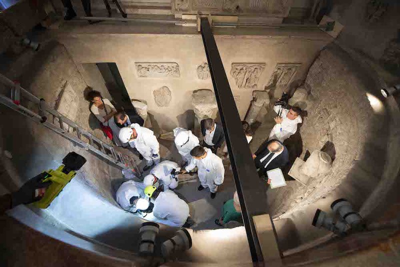 Workers inspect an ossuary at the Teutonic Cemetery at the Vatican July 20