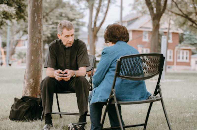 Fr. David Burgard participates in "Priests in the Park." Credit: Valaurian Waller / Detroit Catholic. Used with permission.