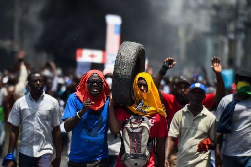 Protests in downtown Port-au-Prince drew nearly 2