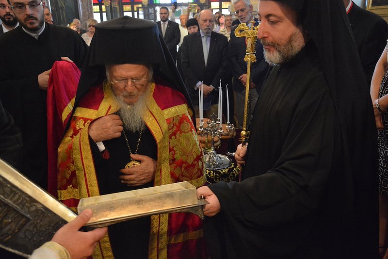 Ecumenical Patriarch Bartholomew of Constantinople prays before a reliquary containing bone shards that are believed to belong to St. Peter June 30
