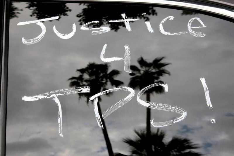 "Justice 4 TPS" is seen Oct. 3