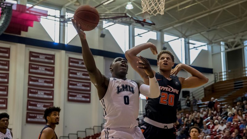 Eli Scott goes up for two of his 17 points in LMU’s 74-70 win over Pepperdine on Jan. 19 at Gersten Pavilion. (LMU ATHLETICS)