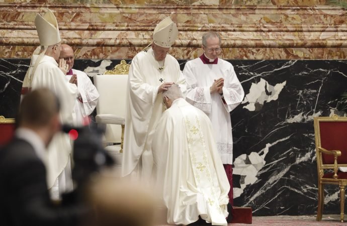 Pope Francis touches the head of Mons. Alberto Ricardo Lorenzelli as he celebrates his Episcopal Ordination