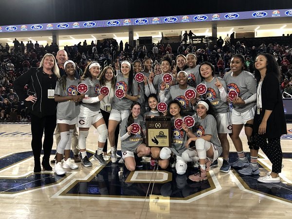 Chaminade girls' basketball team celebrates their win Feb. 23. (PHOTO COURTESY CHAMINADE ATHLETICS TWITTER)