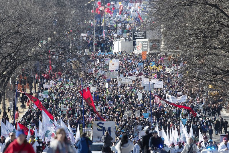 People walk up Constitution Avenue headed toward the U.S. Supreme Court while participating in the 45th March for Life Jan. 19 in Washington. The 2019 March for Life is Jan. 18 and the theme will be "Unique from Day One." (CNS photo/Michael Reynolds