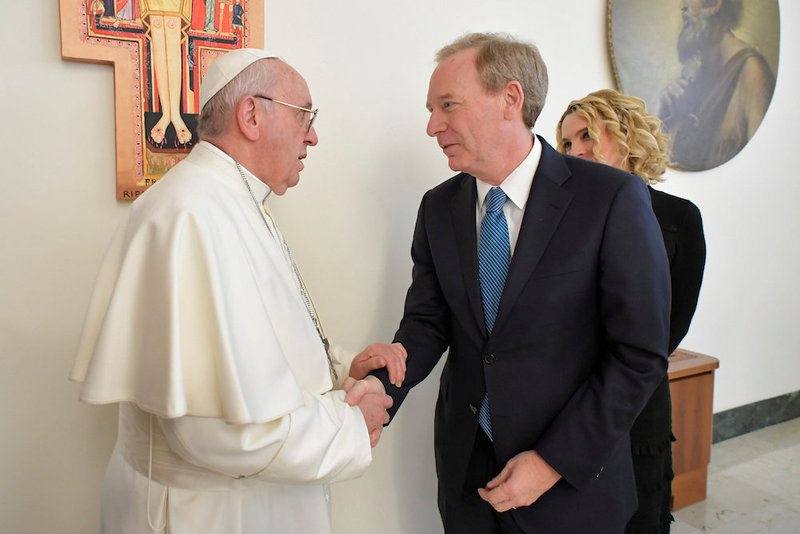 Pope Francis greets Brad Smith