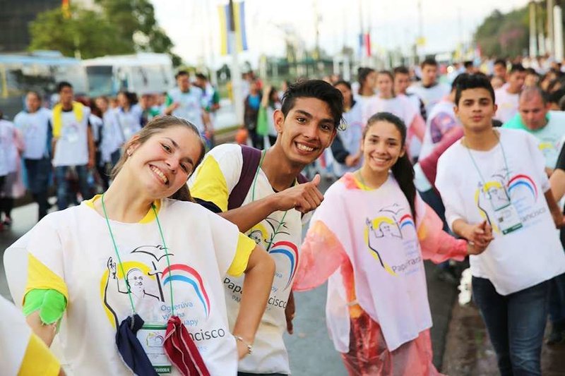 Children wait for Pope Francis during his visit to Asuncion