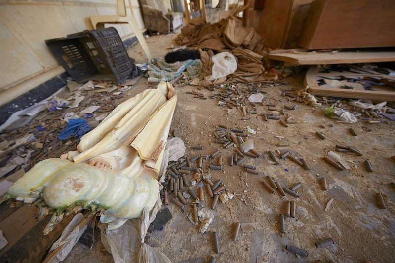 A survey of damage as seen in November 2016 at the Church of the Immaculate Conception in Bakhdida