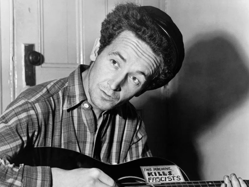 Woody Guthrie (IMAGE VIA THEATRICUM.COM)