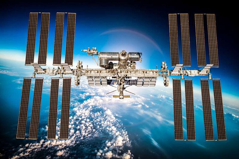 International Space Station over the Earth. Elements of this image furnished by NASA (Credit: Andrey Armyagov/Shutterstock)