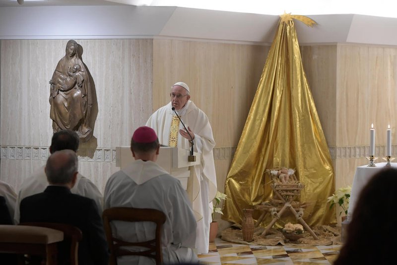 Pope Francis delivers the homily as he celebrates morning Mass in the chapel of his residence