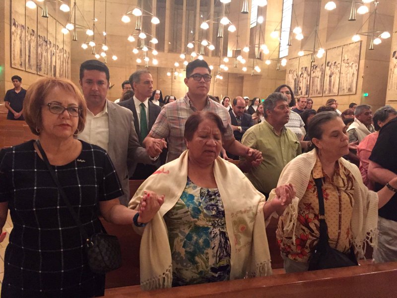 A group gathered at the Cathedral of Our Lady of the Angels Nov. 10 for an ecumenical service to pray for peace