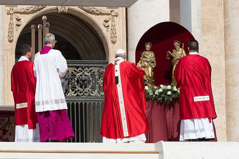 Pope Francis incenses statues of Ss. Peter and Paul during Mass for their feast in St. Peter's Square