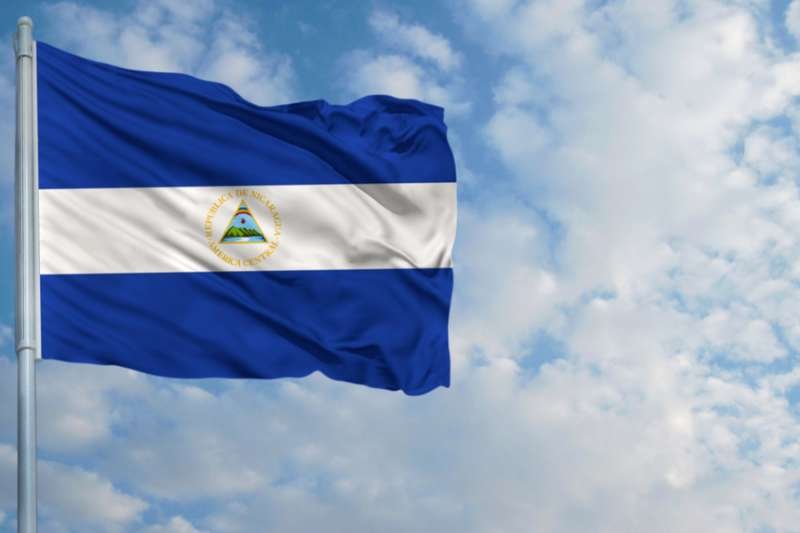 The flag of Nicaragua. Credit: Millenius/Shutterstock.