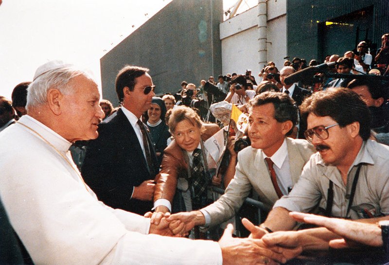 St. John Paul II greets members of the media