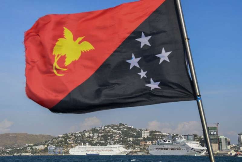 Papua New Guinea flag flies ahead of the Nov. 17-18 APEC summit. Credit: James D. Morgan / Getty Images News.