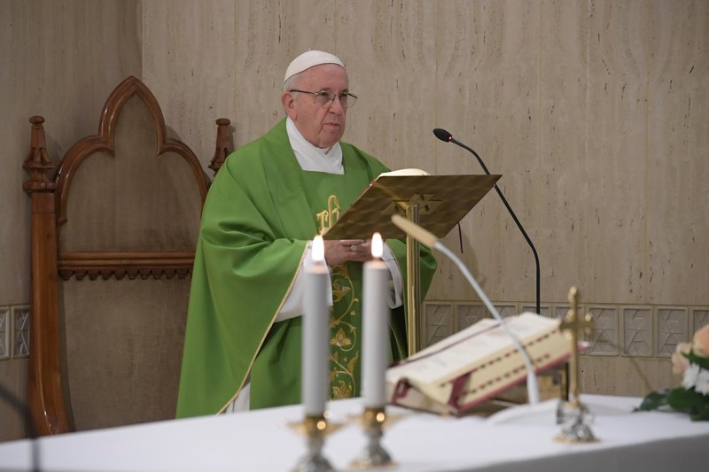 Pope Francis gives the homily as he celebrates morning Mass in the chapel of his residence