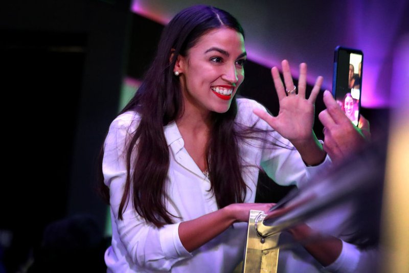 Alexandria Ocasio-Cortez celebrates her victory at La Boom night club in Queens on November 6