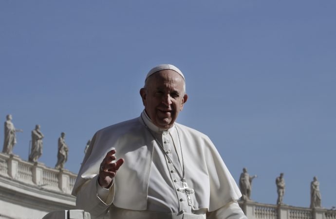 Pope Francis arrives for his weekly general audience