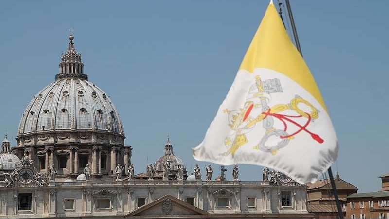 A view of St. Peter's Basilica and the Vatican City flag. (Bohumil Petrik/CNA)