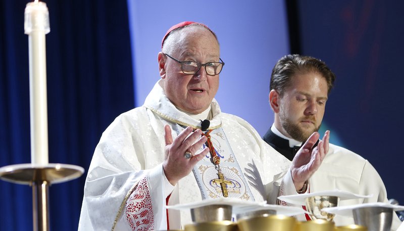 New York Cardinal Timothy M. Dolan prays over the gifts during Mass July 20, 2019. (CNS photo/Gregory A. Shemitz, Long Island Catholic)