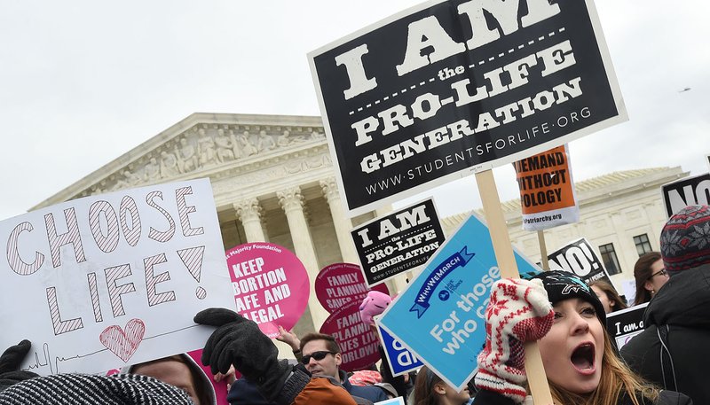 Pro-life advocates gather outside the U.S. Supreme Court Jan. 27, 2017, during the annual March for Life in Washington. According to a report released Sept. 18, 2019, by the Guttmacher Institute, which researches data on abortion, the number and rate of abortions nationwide have fallen to their lowest levels since the Supreme Court's Roe v. Wade decision legalized abortion on demand in 1973. The report is based on data from 2017, the last year for which full numbers were available. (CNS photo/Leslie E. Kossoff)