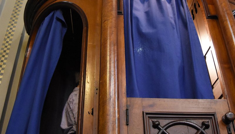 The Australian states of Victoria and Tasmania have become the latest in the country to pass legislation criminalizing priests who fail to report the abuse of children disclosed during confession. The entire country's six states and two territories are expected have such laws in place in coming months.(CNS photo/Mike Stechschulte, The Michigan Catholic)