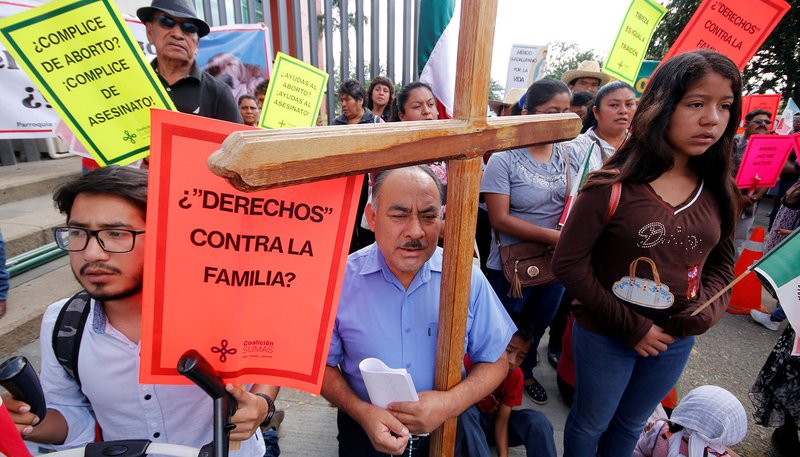 Pro-life supporters pray during a protest outside the local congress in Oaxaca, Mexico, Sept. 25, 2019, before lawmakers approved a measure to decriminalize abortion, despite vocal church opposition. (CNS photo/Jorge Luis Plata, Reuters)