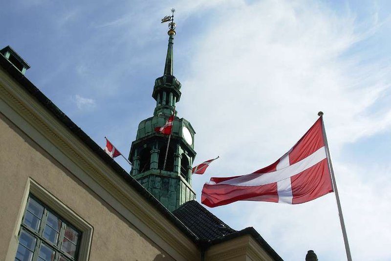 The Danish flag above a municipal administration building. Credit: Aidan Wakely-Mulroney via Flickr (CC BY-NC-ND 2.0