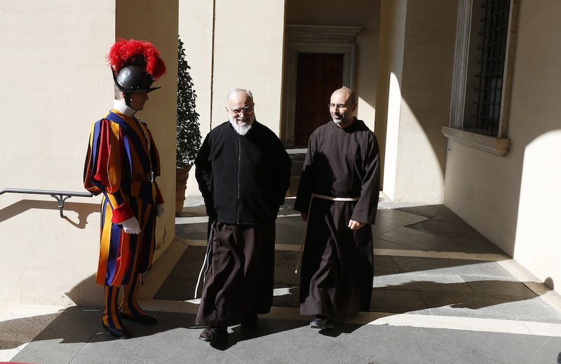 Capuchin Father Raniero Cantalamessa, preacher of the papal household, center, walks with an unidentified clergyman outside the Apostolic Palace after giving Lenten meditations to Pope Francis and members of the Roman Curia March 23 at the Vatican. For more than 38 years, Father Cantalamessa has preached to the […]