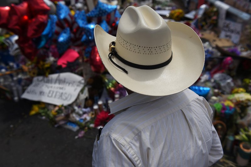 A man pays his respects Aug. 8