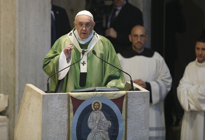 Pope Francis gives the homily as he celebrates Mass at the Parish of St. Crispin in a suburb on the outskirts of Rome March 3